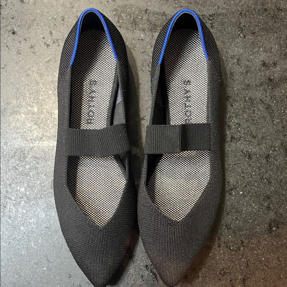 Rothy’s Black Ballet Flats with Blue trim.  Size 9.5.